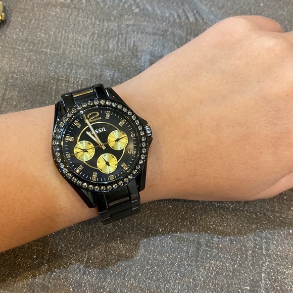 Black Fossil watch with gold and rhinestone detail. - Picture 2 of 3